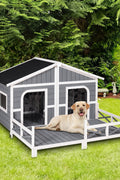 Large wooden raised outdoor dog house with porch – cabin-style weatherproof pet shelter
