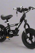 Kids 16" black electric balance bike with training wheels
Side view of 12" black lithium e-bike for children