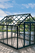 luxury tempered glass greenhouse in garden setting
aluminum-framed greenhouse with gabled roof
inside view of premium glass greenhouse
eco-friendly garden greenhouse with powder-coated frame
full-sunlight greenhouse for plants and vegetables