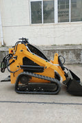 “T380 compact skid steer loader with rubber tracks”

“T460 mini tracked loader for landscaping and excavation”

“Heavy-duty skid steer with universal quick attach plate”

“Tracked compact construction loader in yellow”