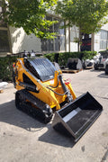 “T380 compact skid steer loader with rubber tracks”

“T460 mini tracked loader for landscaping and excavation”

“Heavy-duty skid steer with universal quick attach plate”

“Tracked compact construction loader in yellow”