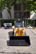 “T380 compact skid steer loader with rubber tracks”

“T460 mini tracked loader for landscaping and excavation”

“Heavy-duty skid steer with universal quick attach plate”

“Tracked compact construction loader in yellow”