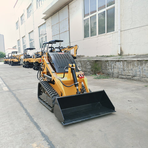 “T380 compact skid steer loader with rubber tracks”

“T460 mini tracked loader for landscaping and excavation”

“Heavy-duty skid steer with universal quick attach plate”

“Tracked compact construction loader in yellow”