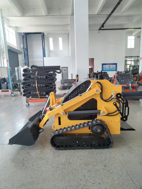 “T380 compact skid steer loader with rubber tracks”

“T460 mini tracked loader for landscaping and excavation”

“Heavy-duty skid steer with universal quick attach plate”

“Tracked compact construction loader in yellow”