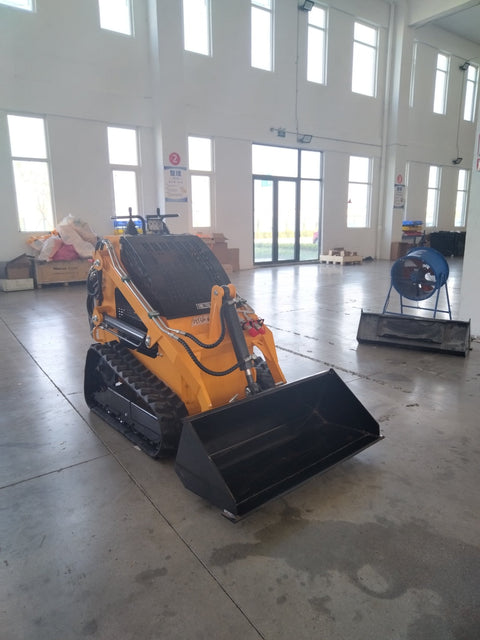 “T380 compact skid steer loader with rubber tracks”

“T460 mini tracked loader for landscaping and excavation”

“Heavy-duty skid steer with universal quick attach plate”

“Tracked compact construction loader in yellow”