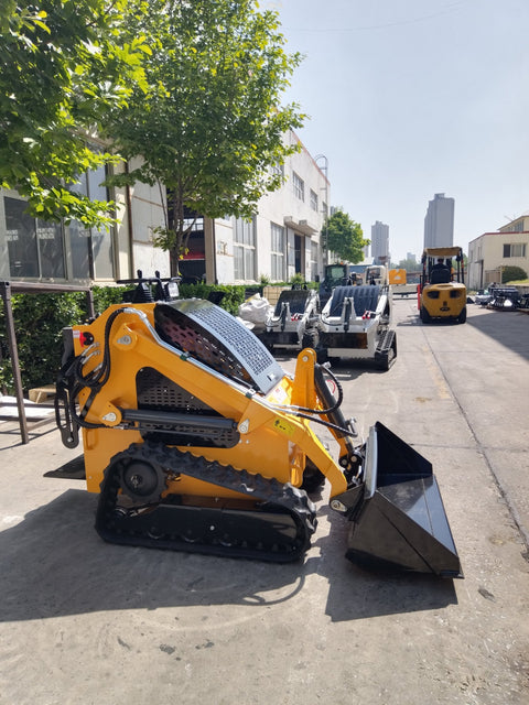 “T380 compact skid steer loader with rubber tracks”

“T460 mini tracked loader for landscaping and excavation”

“Heavy-duty skid steer with universal quick attach plate”

“Tracked compact construction loader in yellow”