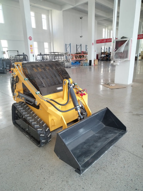 “T380 compact skid steer loader with rubber tracks”

“T460 mini tracked loader for landscaping and excavation”

“Heavy-duty skid steer with universal quick attach plate”

“Tracked compact construction loader in yellow”