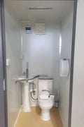 Gray single toilet portable restroom trailer
Double stall mobile toilet unit for construction use
Interior view of portable washroom with sink
Mobile shower unit with privacy enclosure
Pre-installed fixtures inside portable toilet and shower model