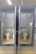 Gray single toilet portable restroom trailer
Double stall mobile toilet unit for construction use
Interior view of portable washroom with sink
Mobile shower unit with privacy enclosure
Pre-installed fixtures inside portable toilet and shower model