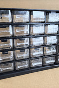 Multipurpose fastener kit with labeled drawers

1001-piece screw and bolt organizer cabinet

Open storage cabinet with hardware compartments

Assorted fasteners and storage trays

Compact metal fastener case for shop and garage use