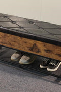 "Black faux leather padded entryway storage bench with metal frame and open shoe shelf"

