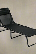 Black Adjustable Folding Patio Chaise Lounge Chair – Side View

Reclining Outdoor Lounge Chair Folded for Storage

Cushioned Folding Chaise Chair – Adjustable Backrest Positions

Patio Recliner in Outdoor Use Setting – Backyard or Poolside

Person Relaxing on Black Folding Patio Chaise Chair

