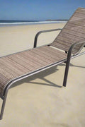 Reclining folding patio lounger chair on the beach

Adjustable sun lounger with breathable Teslin mesh

Close-up of outdoor lounger armrest and frame

Folded outdoor lounge chair ready for storage

Lounger chair beside swimming pool deck
