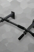 Wall-mounted black steel pull-up bar – front angle view

Pull-up bar installed on wall for home gym

Multi-grip fitness pull-up bar with foam handles

Compact strength training bar for upper-body workouts

Wall mount hardware and bar installation demonstration