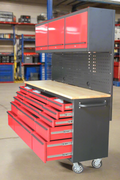 Red 17-drawer rolling tool chest with workbench top
Heavy-duty garage tool cabinet with rubberwood work surface
Industrial mobile workbench with 15 smooth-glide drawers
Garage storage cabinet with aluminum handles and locking system