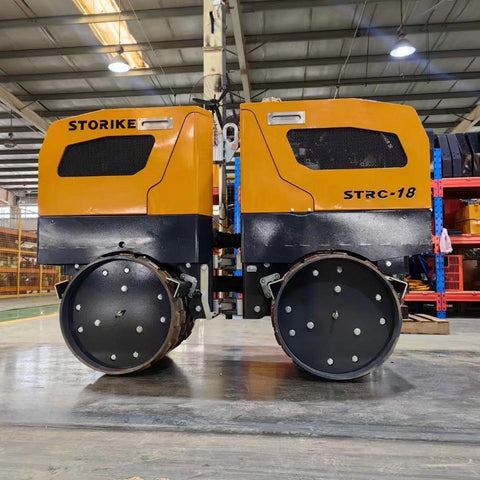 Front View of STORIKE 1114418 Remote-Controlled Trench Roller

Remote Control Device for Trench Roller Compactor

Side View of Heavy-Duty Soil Compactor Roller

STORIKE Trench Roller in Industrial Setting

Rear Angle of Remote-Controlled Soil Compactor