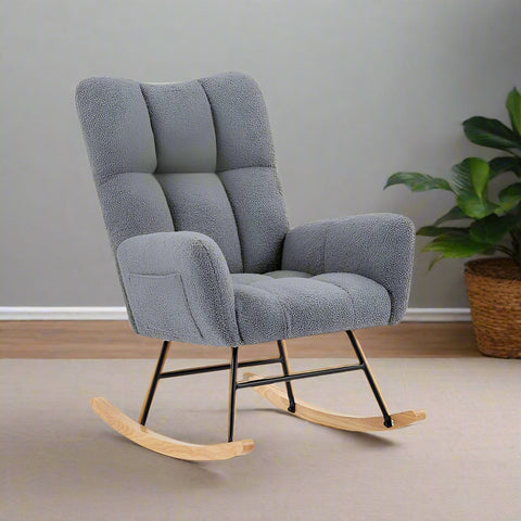 Gray ergonomic glider rocking chair for nursery with wood base
White soft upholstered rocking chair with curved wood base
Rocking chair for the living room with ergonomic support and plush padding