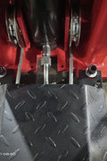 2-post vehicle lift in red installed in garage

Close-up of lifting arms and safety lock mechanism

Base of hoist with truck tires for scale

Top bar and hydraulic system – JH5000F model
