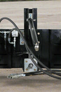 Skid steer PTO adapter with quick attach arms
Full view of 965071 skid steer PTO adapter
PTO adapter showing hydraulic hookups
Rear view of the 3-point quick attach
Skid steer attachment connected to PTO adapter