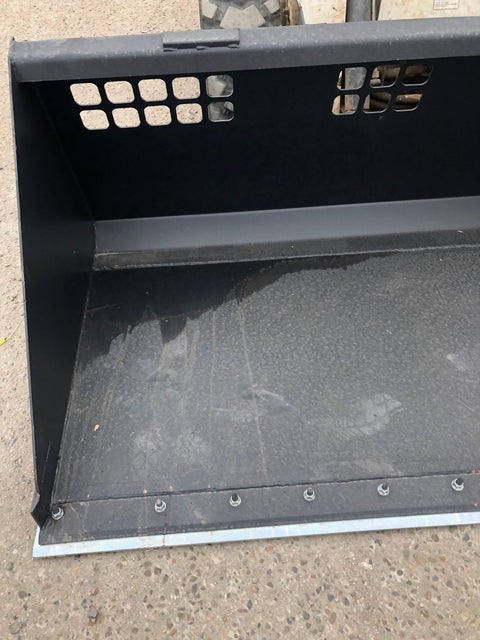 Side view of high-volume snow bucket
