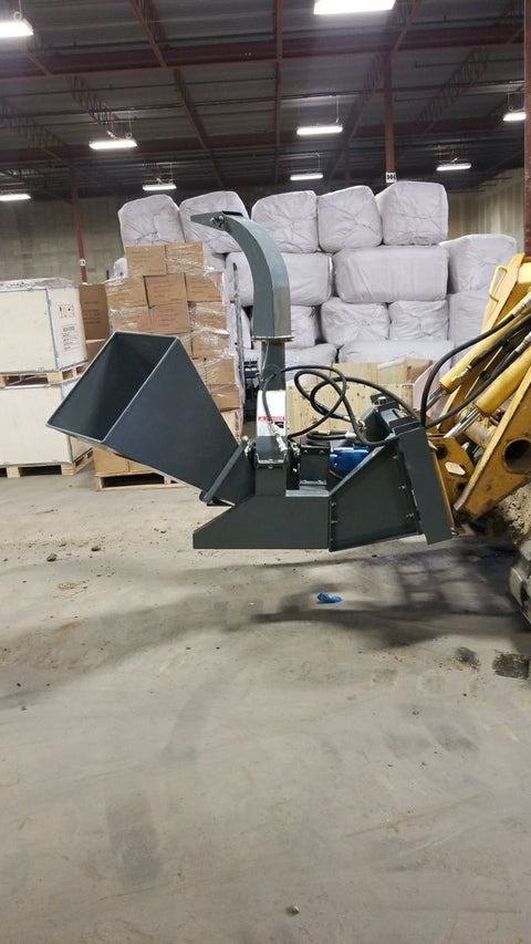 BX42 wood chipper attachment side view
Front-facing view of skid steer wood chipper BX42
Close-up of BX42 hydraulic chute and rotor
Rear view showing input hopper and feed
Mounted BX42 chipper on skid steer
