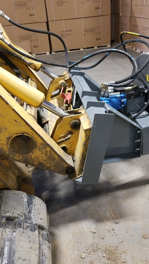 BX42 wood chipper attachment side view
Front-facing view of skid steer wood chipper BX42
Close-up of BX42 hydraulic chute and rotor
Rear view showing input hopper and feed
Mounted BX42 chipper on skid steer