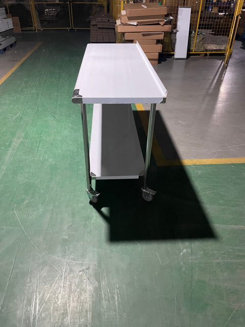 Stainless steel rolling work table with locking wheels – front view

48-inch stainless steel prep station with under-shelf and casters

72-inch commercial kitchen table with wheels – side angle

Mobile food service prep table with heavy-duty design

Industrial stainless table in warehouse environment