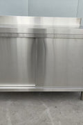 Stainless steel workbench with sliding doors front view

Restaurant prep table with built-in storage

Commercial kitchen stainless steel workbench

Side view of sliding door stainless work table

Heavy-duty garage workbench with stainless cabinet