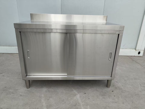 Stainless steel workbench with sliding doors front view

Restaurant prep table with built-in storage

Commercial kitchen stainless steel workbench

Side view of sliding door stainless work table

Heavy-duty garage workbench with stainless cabinet