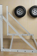 Steel wall-mounted folding tire and wheel storage rack – 300 lb capacity – adjustable width