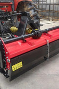 71 inch PTO rotary tiller for tractors
Red 3-point rotary tiller with 42 tines
Side view of heavy-duty tractor tiller attachment
PTO-powered tiller for 40-75 HP tractors
Rear garden rotary tiller with safety guard
Rotary tiller in warehouse – SKU IGN180