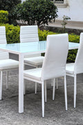 White glass dining table set with 4 chairs in the bright kitchen
Close-up of white glass table and upholstered chair
Side angle of a full 5-piece dining set
White dining chairs around a modern glass table
Dining set outdoors showing full product design