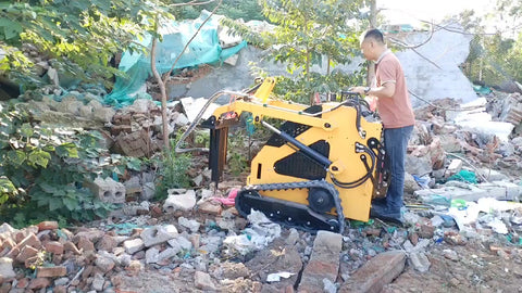 “T380 compact skid steer loader with rubber tracks”

“T460 mini tracked loader for landscaping and excavation”

“Heavy-duty skid steer with universal quick attach plate”

“Tracked compact construction loader in yellow”