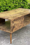"Rustic mid-century solid wood coffee table with tapered legs and oak finish – Model TLCT2113"
