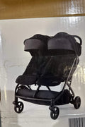Summer Infant 3Dpac CS+ double stroller in black with car seat compatibility and large canopies
Compact lightweight double stroller with two seats and peekaboo windows
Black twin stroller folded for easy transport
Close-up of stroller seat recline and under-storage basket