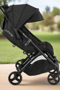 Summer Infant 3Dpac CS+ double stroller in black with car seat compatibility and large canopies
Compact lightweight double stroller with two seats and peekaboo windows
Black twin stroller folded for easy transport
Close-up of stroller seat recline and under-storage basket