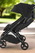 Summer Infant 3Dpac CS+ double stroller in black with car seat compatibility and large canopies
Compact lightweight double stroller with two seats and peekaboo windows
Black twin stroller folded for easy transport
Close-up of stroller seat recline and under-storage basket