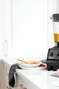 Vitamix Explorian Blender, Professional - Grade, 64 oz. Low - Profile Container, Black - 65542 (Renewed Premium) - with Black | Sold by Uncle Wiener's Wholesale